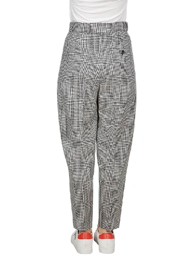 Shop Alexander Mcqueen Heritage Check Trousers In Black White