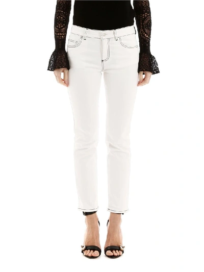 Shop Alexander Mcqueen Jeans With Contrast Seams In Chalk (white)