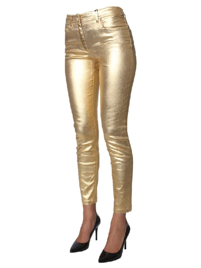 Shop Moschino Bull Trousers In Oro