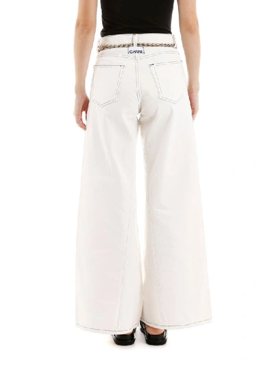 Shop Ganni Flared Jeans In White (white)