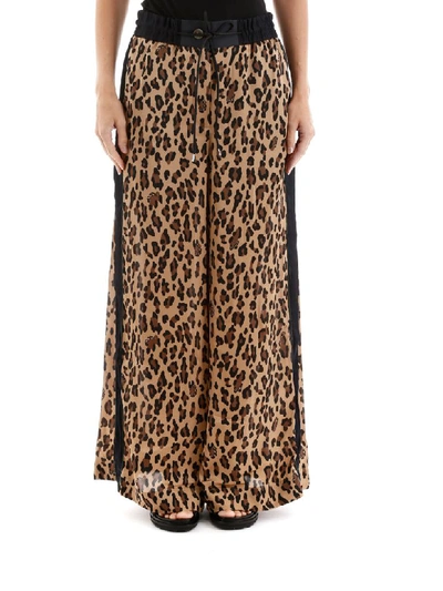 Shop Sacai Leopard Print Trousers In Animalier (brown)