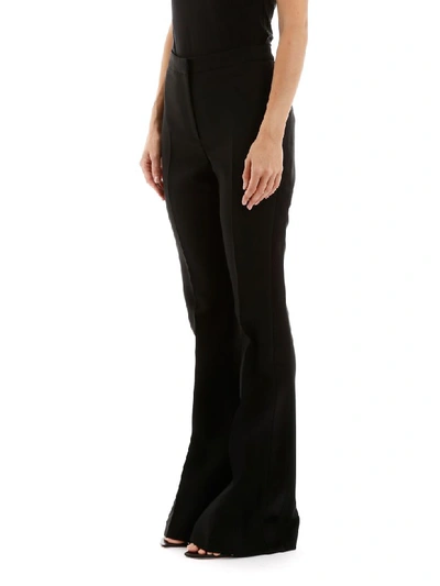 Shop Alexander Mcqueen Trousers With Satin Bands In Black (black)