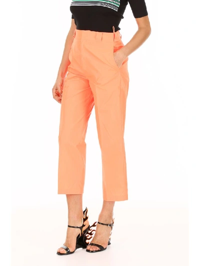 Shop Prada Nylon Gabardine Trousers In Corallo (orange)