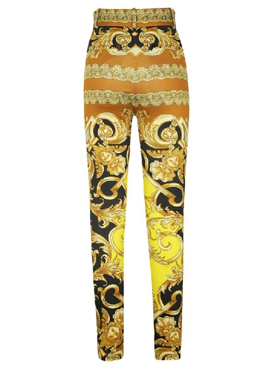 Shop Versace Baroque Print Trousers In Caramel/yellow