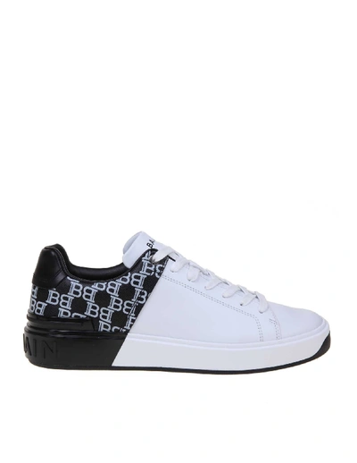 Shop Balmain B-court Sneakers In Leather White / Black In White/black