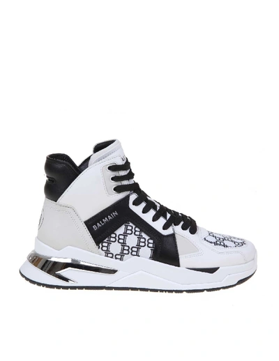 Shop Balmain B-ball Sneakers In White / Black Leather In White/black