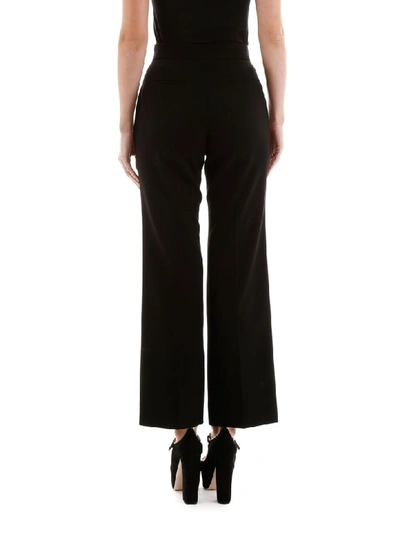 Shop Miu Miu Trousers With Crystal Buckle In Nero (black)