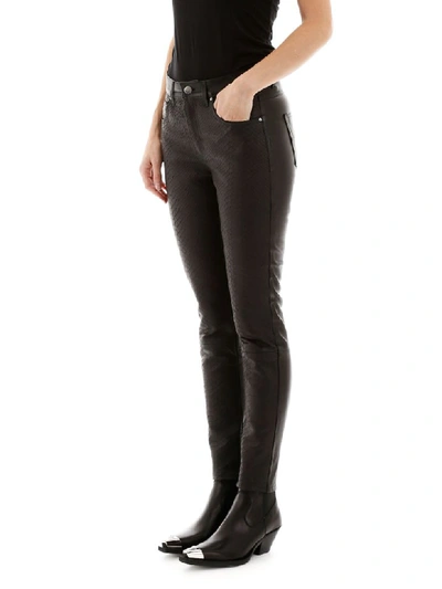 Shop Amiri Python Print Leather Trousers In Black (black)