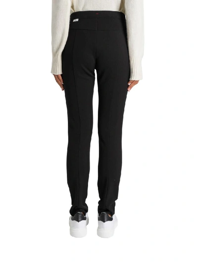 Shop Moncler Stirrups Trousers In Nero