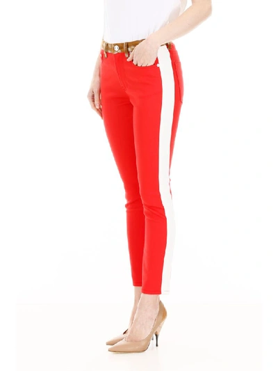 Shop Burberry Bicolor Jeans With Fawn Print In Bright Red (red)