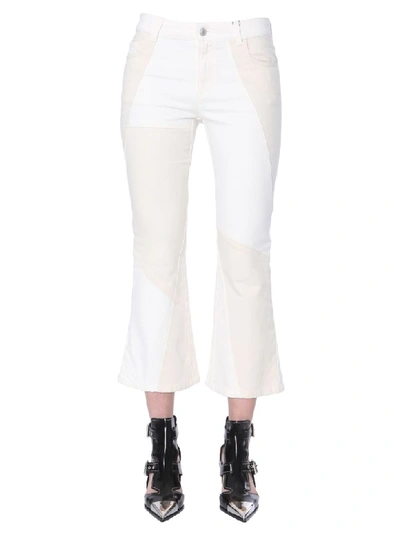 Shop Alexander Mcqueen Kickback Jeans In Beige