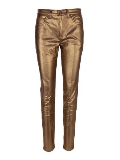 Shop Saint Laurent Jeans In Gold