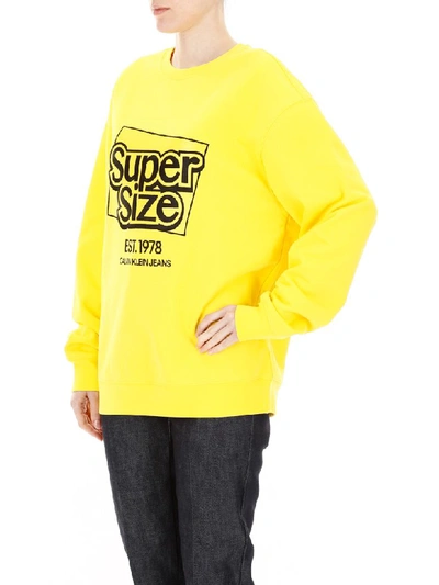 Shop Calvin Klein Super Size Sweatshirt In Yellow Black Supersize (yellow)