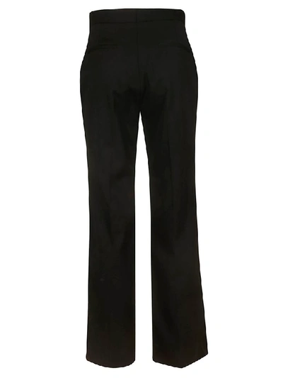 Shop Miu Miu Crystal Embellished Trousers In Black
