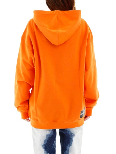 Shop Calvin Klein Orbital Velocity Hoodie In Orange Tiger (orange)
