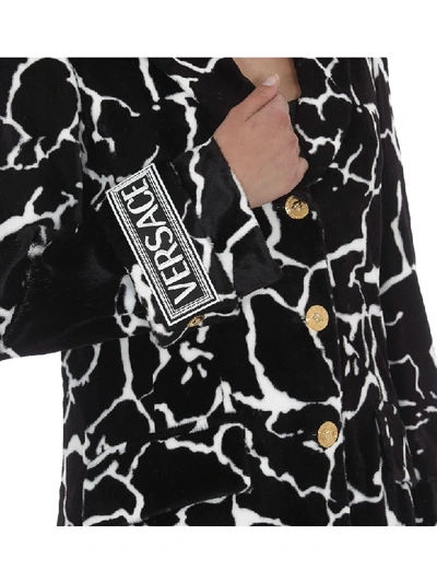 Shop Versace Eco Fur Coat With Giraffe Motif In Black