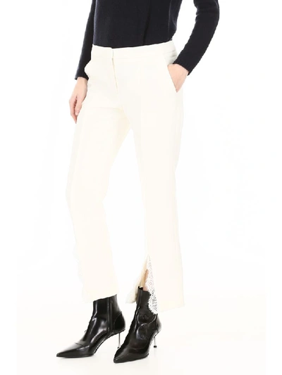 Shop Alexander Mcqueen Trousers With Lace In Light Ivory (white)