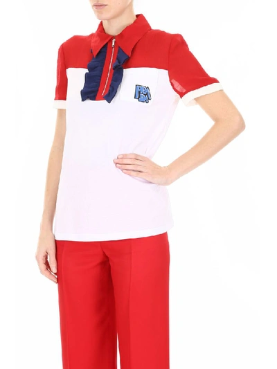 Shop Prada Polo Shirt With Ruffles And Logo Patch In Rosso Bianco Inchios (white)