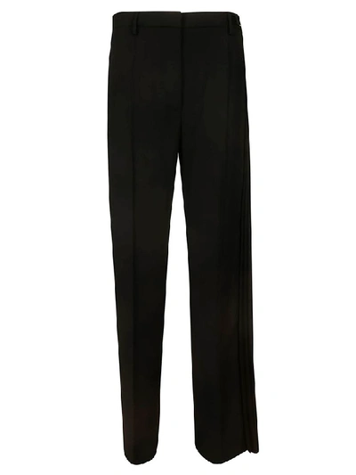 Shop Prada Pleated Trousers In Black