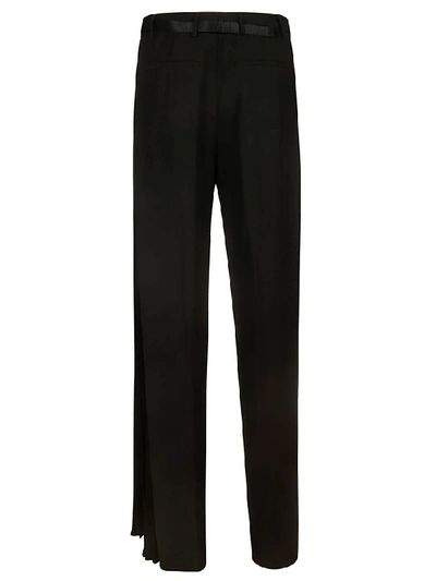 Shop Prada Pleated Trousers In Black