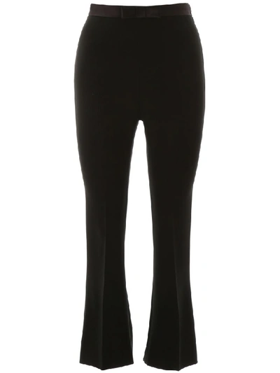 Shop Miu Miu Trousers With Bow In Nero (black)