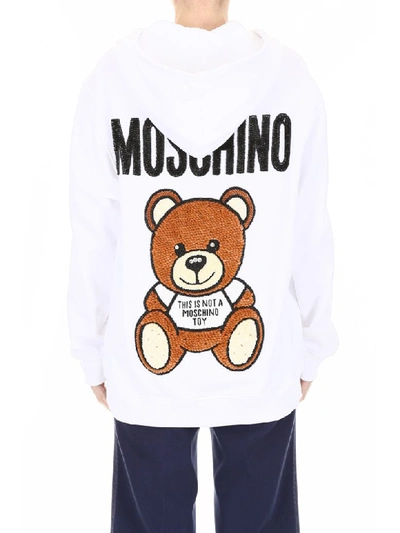 Shop Moschino Teddy Holiday Hoodie In Fantasy Print White (white)