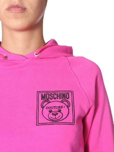 Shop Moschino Hooded Sweatshirt In Fucsia