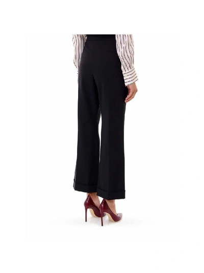 Shop Brunello Cucinelli Trousers In Black