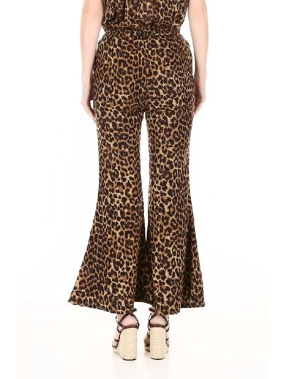 Shop Mes Demoiselles Leopard-printed Flared Trousers In Brown (beige)