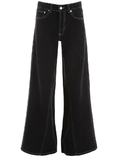 Shop Ganni Flare Jeans In Black (black)