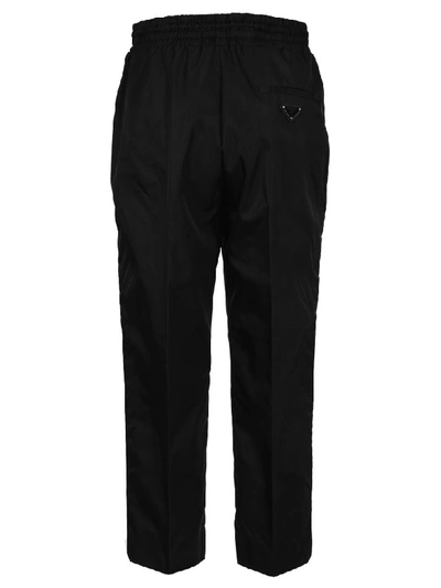 Shop Prada Cropped Track Pants In Black