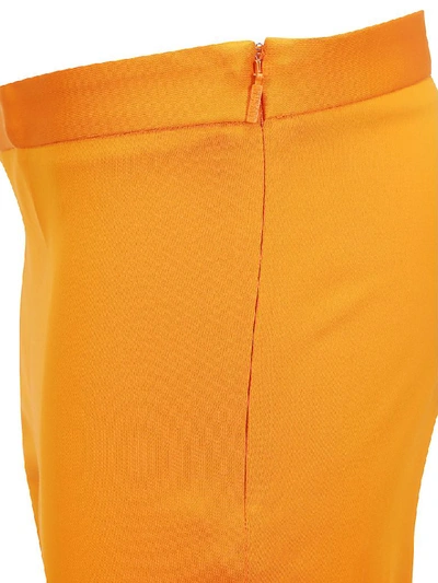 Shop Versace Pants In Arancio