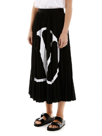 Shop Valentino Vlogo Pleated Skirt In Nero Bianco (black)