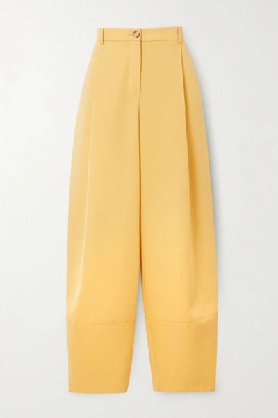 Shop Nina Ricci Pleated Grain De Poudre Wool Tapered Pants In Pastel Yellow