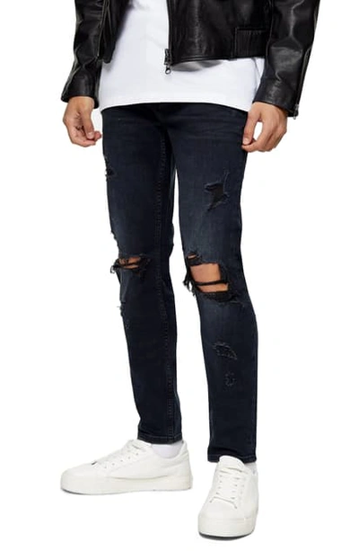 Shop Topman Ripped Skinny Fit Jeans In Dark Blue