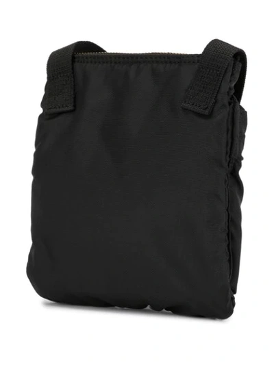 Shop Undercover Word-print Crossbody Bag In Black