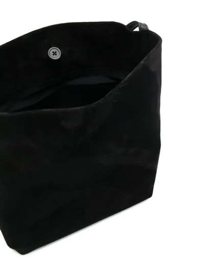 Shop Ann Demeulemeester Button-up Messenger Bag In Black