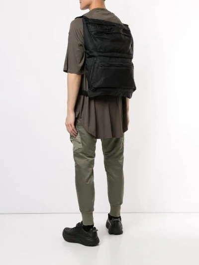 Shop Julius Buckle-detail Zipped Backpack In Black