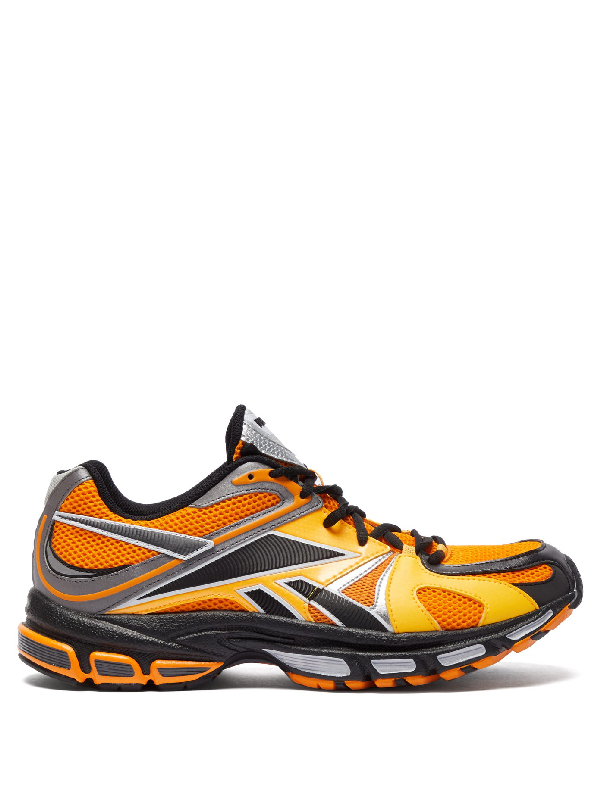 reebok trainers orange