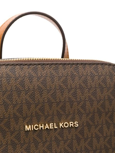 Shop Michael Michael Kors Logo Print Backpack In Brown