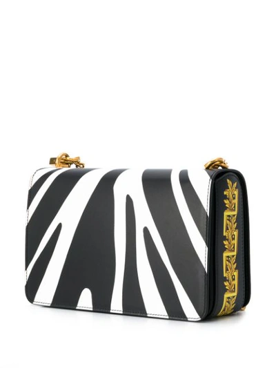 Shop Versace Zebra Print Shoulder Bag In Black