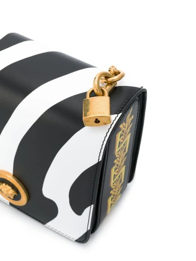 Shop Versace Zebra Print Shoulder Bag In Black