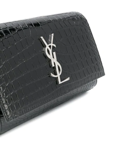 Shop Saint Laurent Kate Crocodile-effect Belt Bag In Black