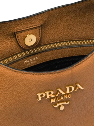 Shop Prada Front Logo Hobo Bag In Neutrals