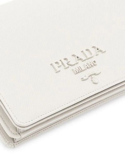 Shop Prada Saffiano Shoulder Bag In White