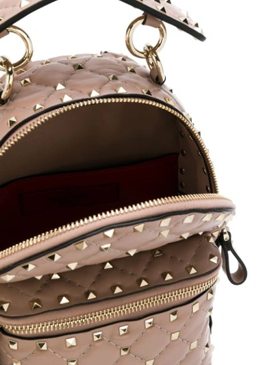 Shop Valentino Garavani Rockstud Mini Backpack In Neutrals