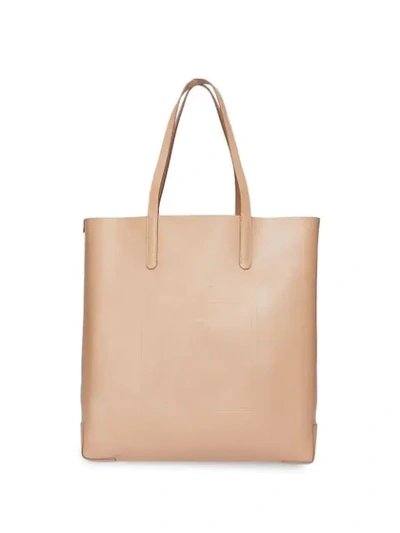 Shop Burberry Logo Embossed Tote - Neutrals