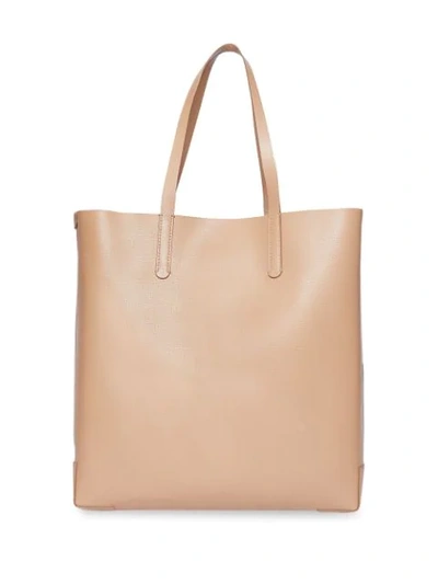 Shop Burberry Logo Embossed Tote - Neutrals
