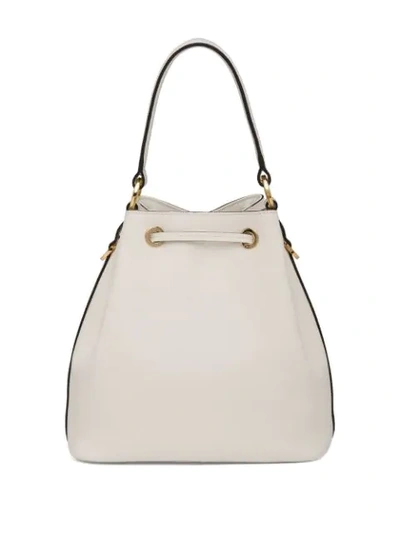 Shop Prada Saffiano Bucket Bag In White