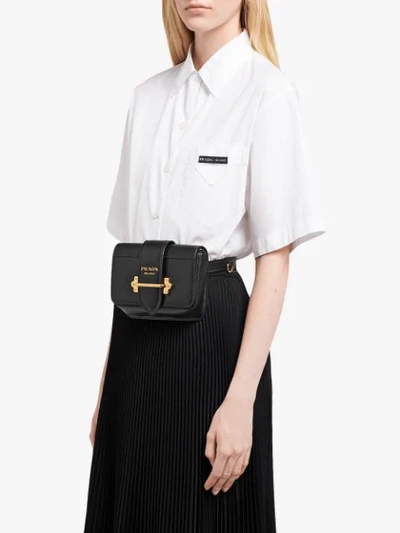 Shop Prada Cahier Belt Bag In Black